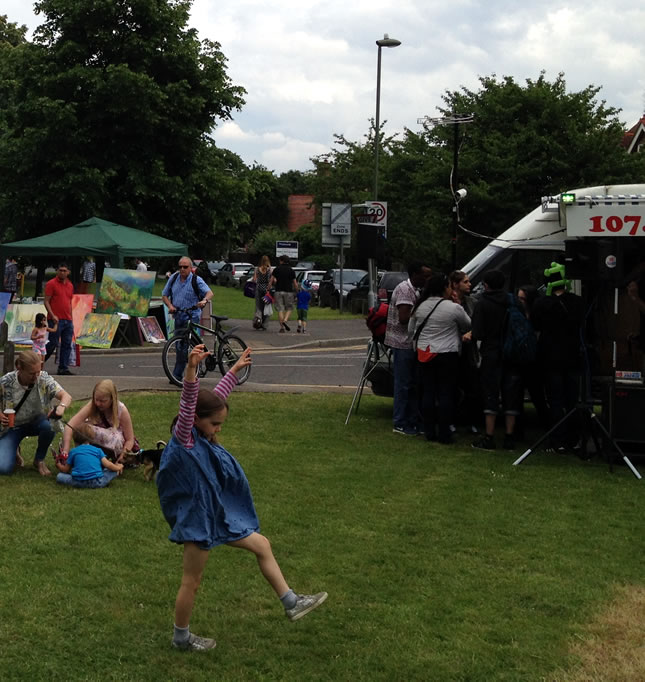 Picnics, children playing, Radio Jackie, food & craft stalls at Weybridge Town Business Group event