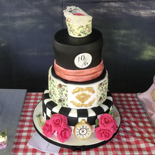 Cake Competion - Celebration runner up by Shamina Giulitti - Checkerboard bottom, black top, roses decoration
