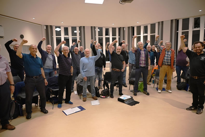 Guys who have fun singing together - Choir provides fellowship